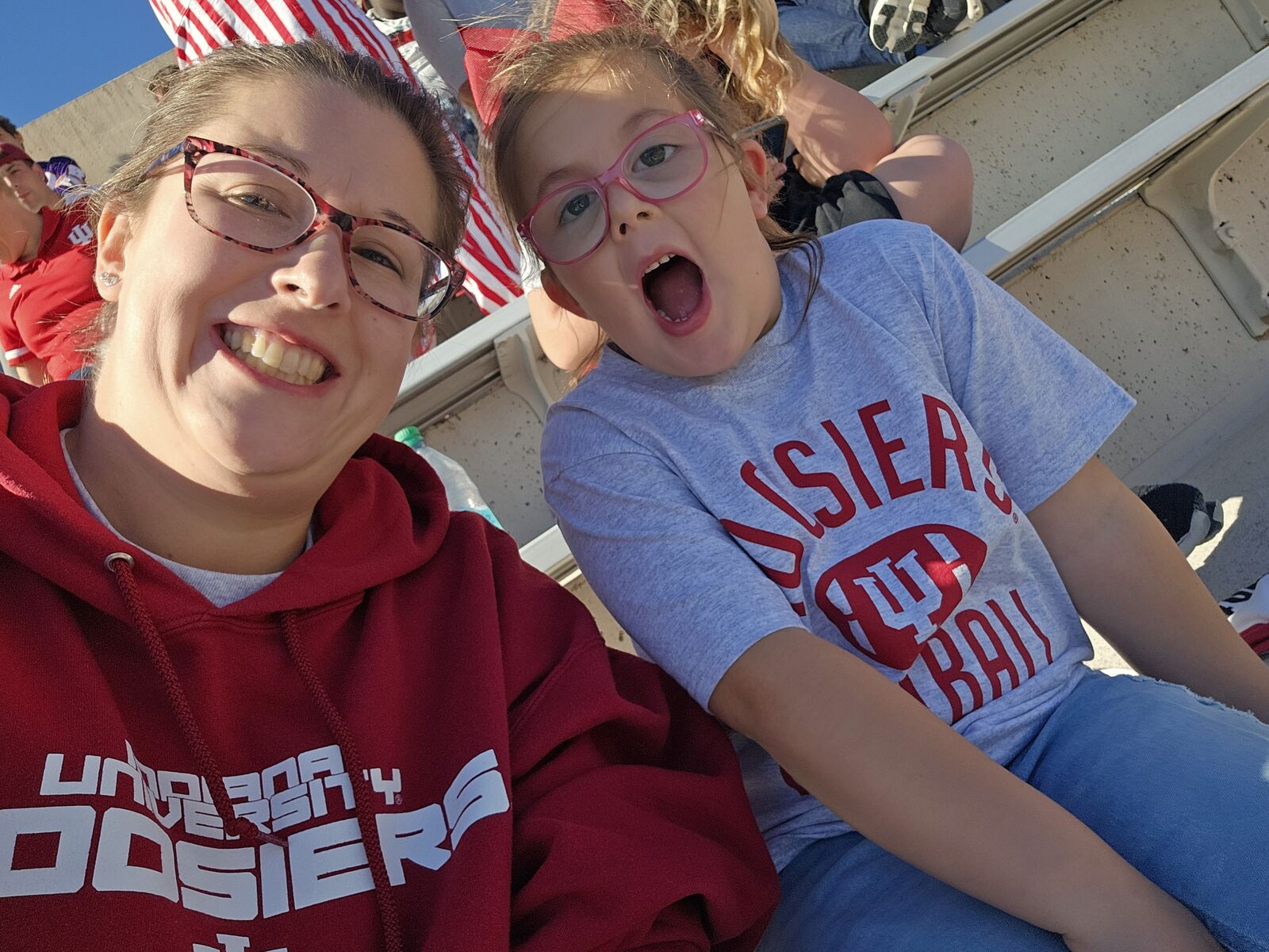 Mother and daughter at an Indiana University football game.